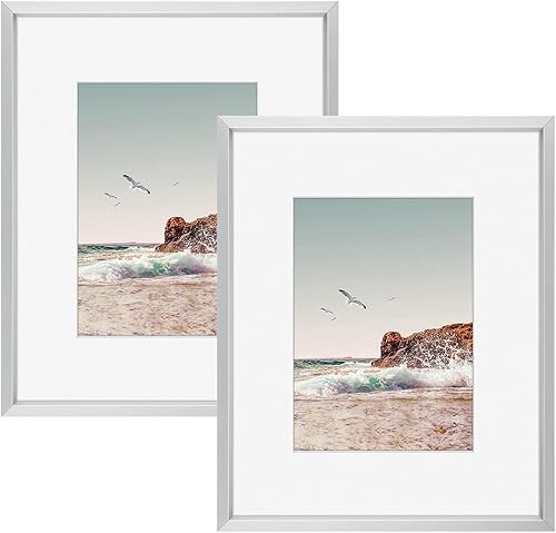 Vista 243 de Frametory - Colección de marcos de metal para fotos, marco de aluminio para fotos con alfombrilla de color marfil y cristal real Dorado