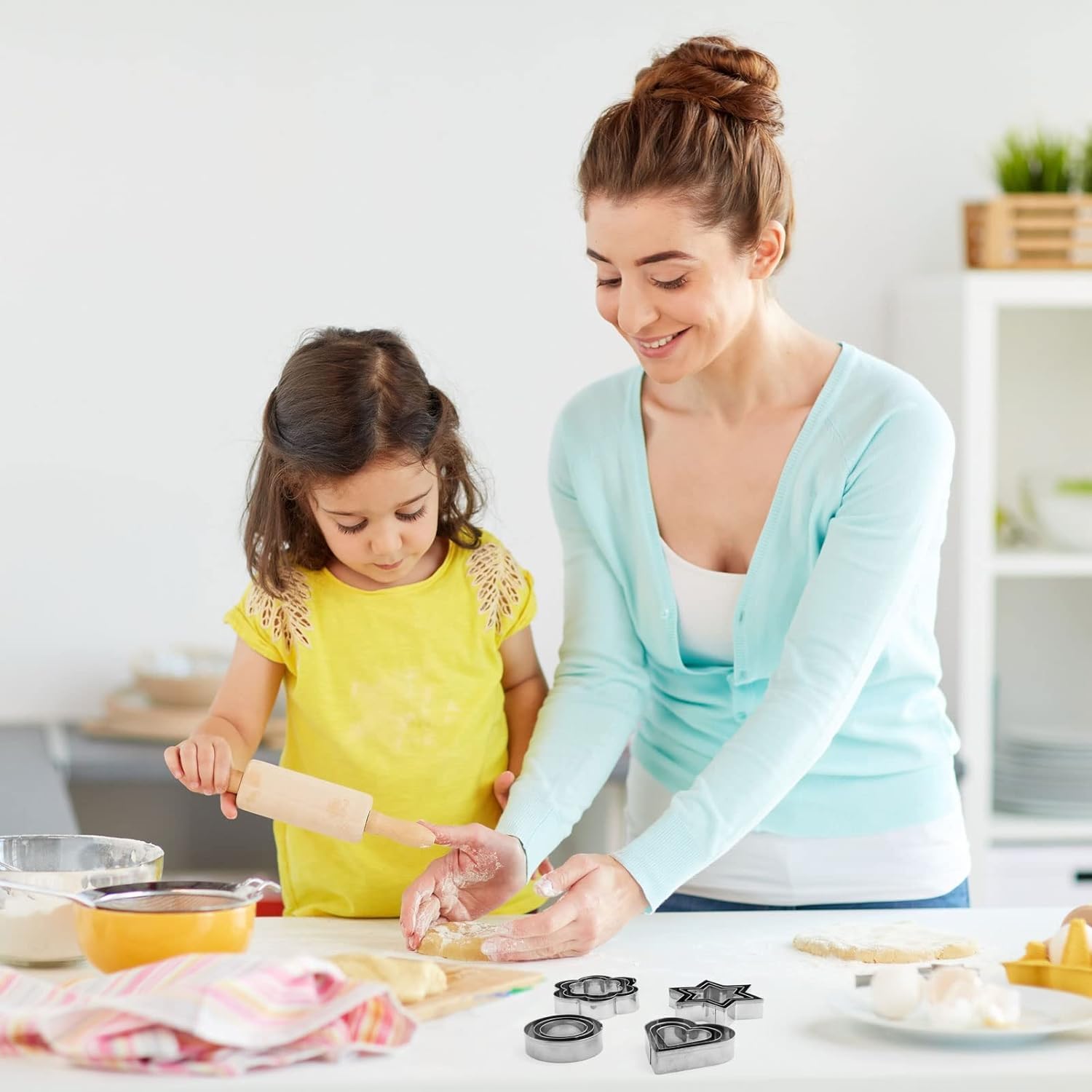 Saylani Enterprises Presents a 12-Piece Cookie Cutter Set, Featuring Star, Heart, Round, and mini Flower molds, All Crafted from Stainless Steel. 1