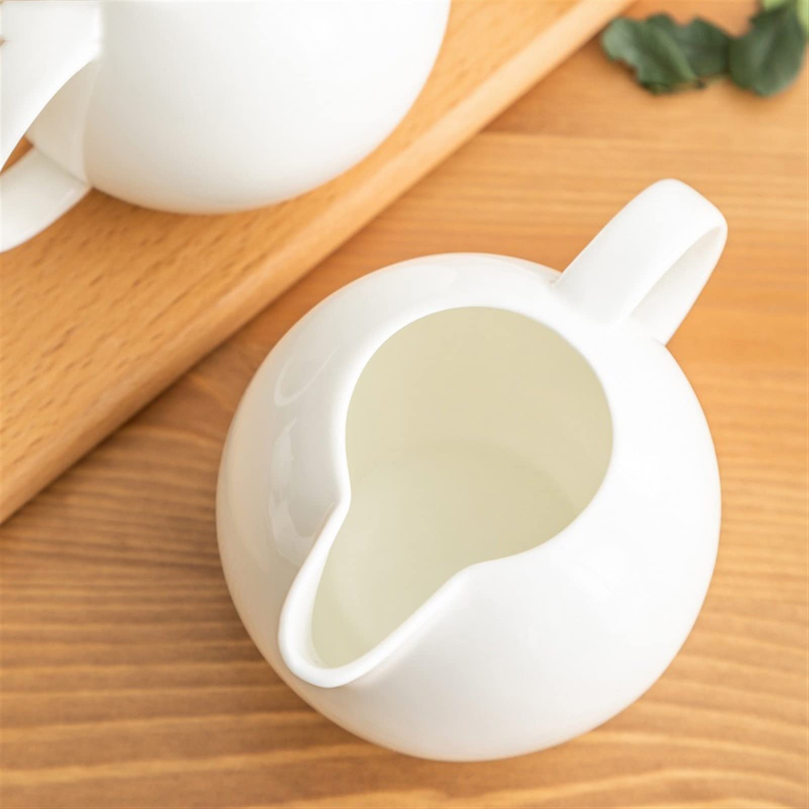 Wykwintne filiżanki do kawy, filiżanki do herbaty, dzbanek do śmietanki klasyczny ceramiczny dzbanek do mleka kawa spieniacz mleka garnek rodzina popołudniowa herbata kawa kubek do mleka restauracja ś