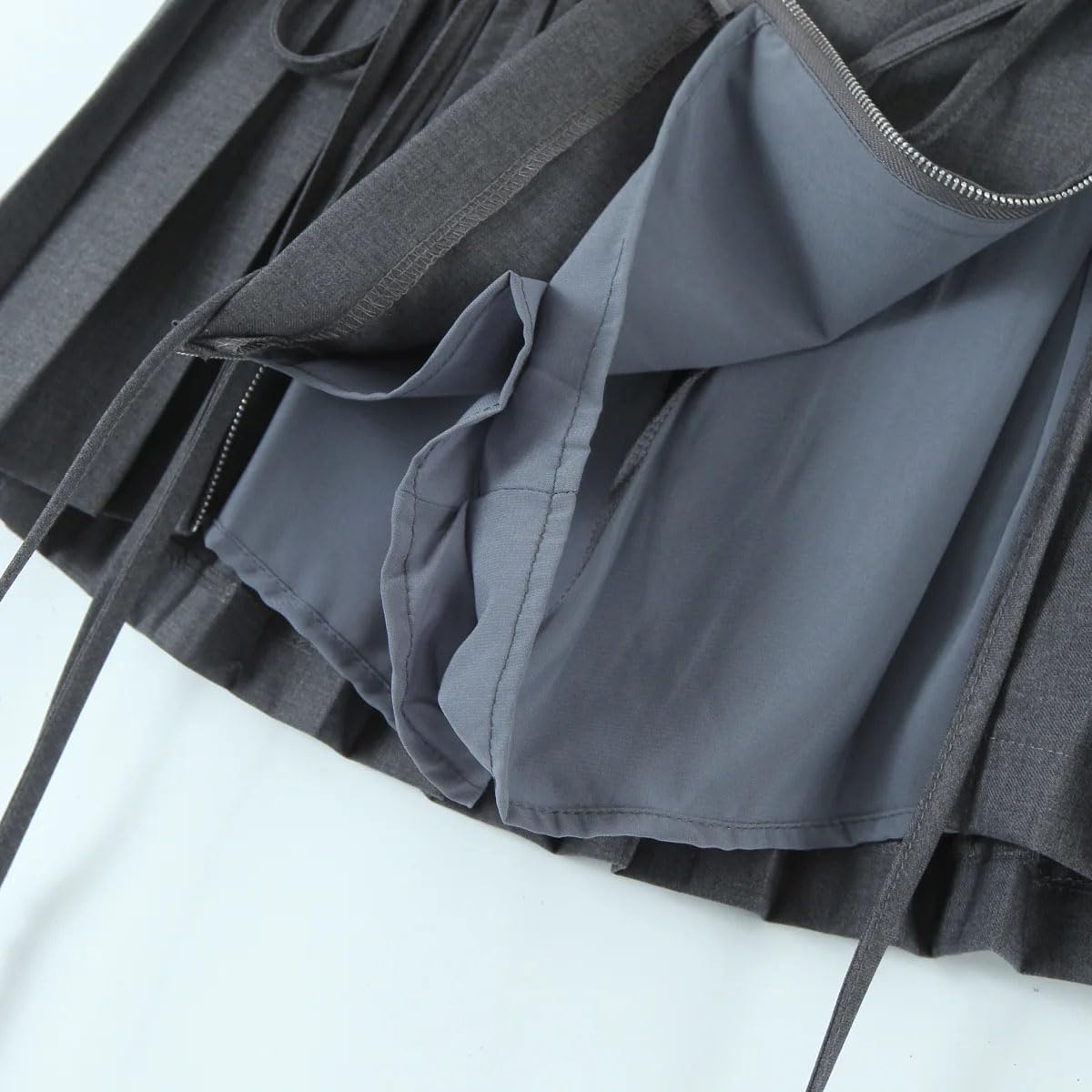 Minigonna da donna a pieghe con coulisse, mini gonna in pizzo con fiocco e cerniera