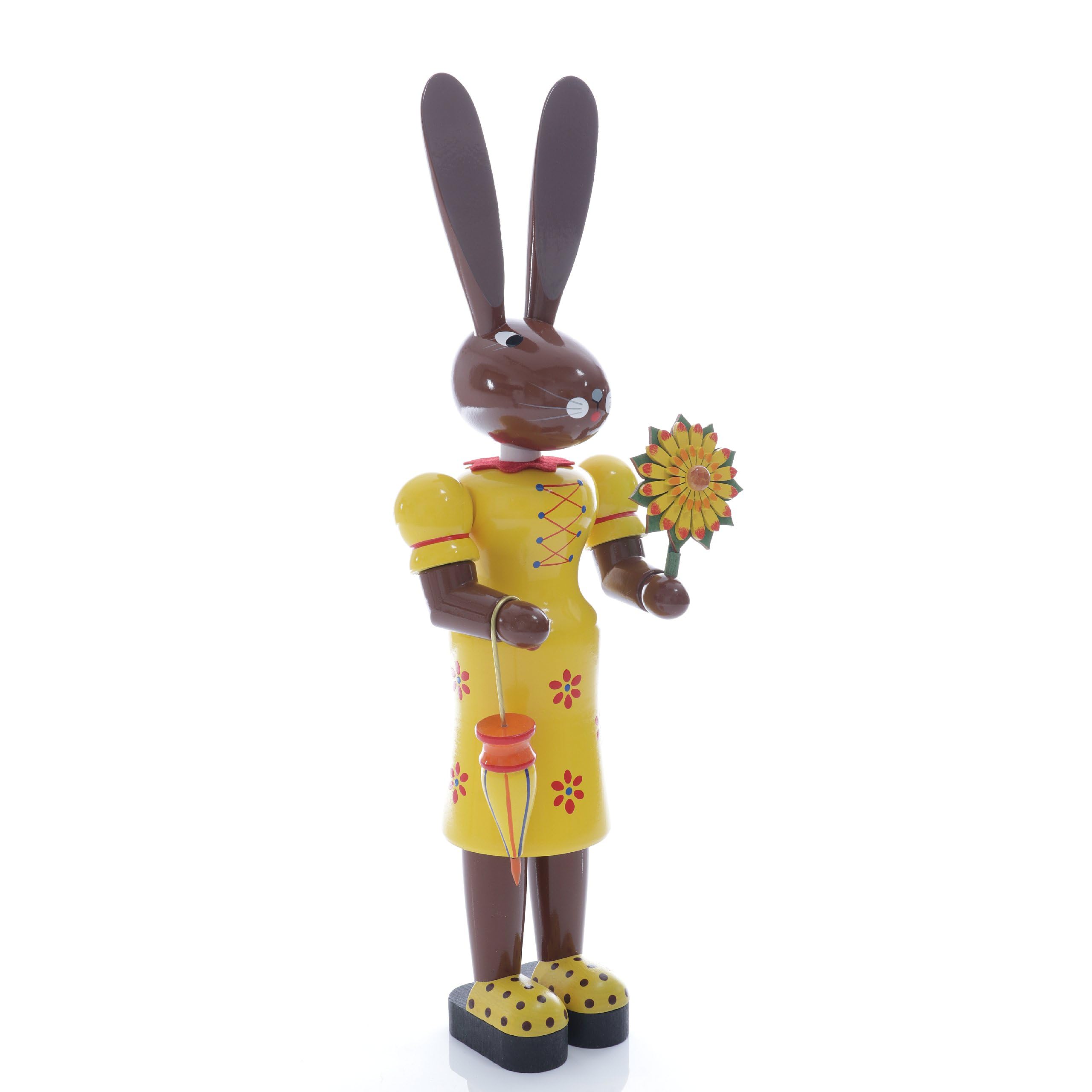 Décoration printanière fleurie avec le coffre au trésor de Pâques Rudolphs jaune