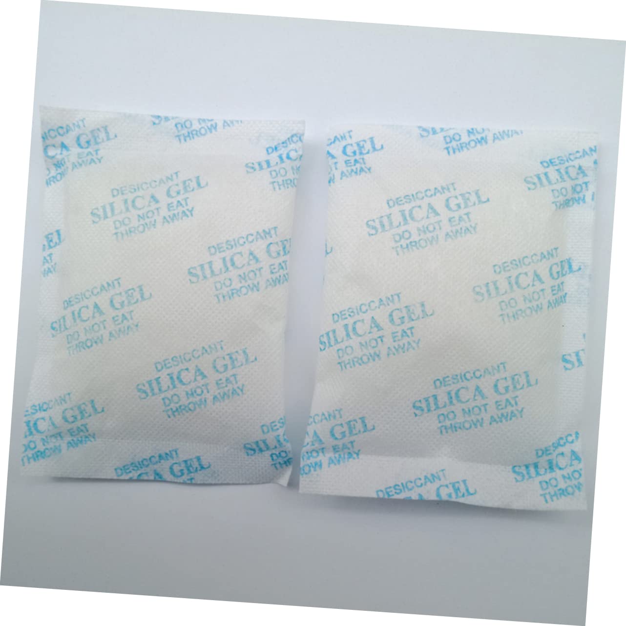 Cabilock Lot de 50 Sachets Déshydratants de Gel de Silice 50g en Tissu Non Tissé Bleu pour Élimination de L'humidité et Prévention Condensation les Armoires
