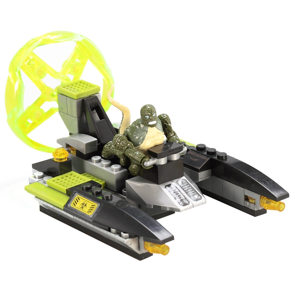 Assembled Mega Bloks Lizard Sewer Speeder with the Lizard figure seated, viewed from the front-right.
