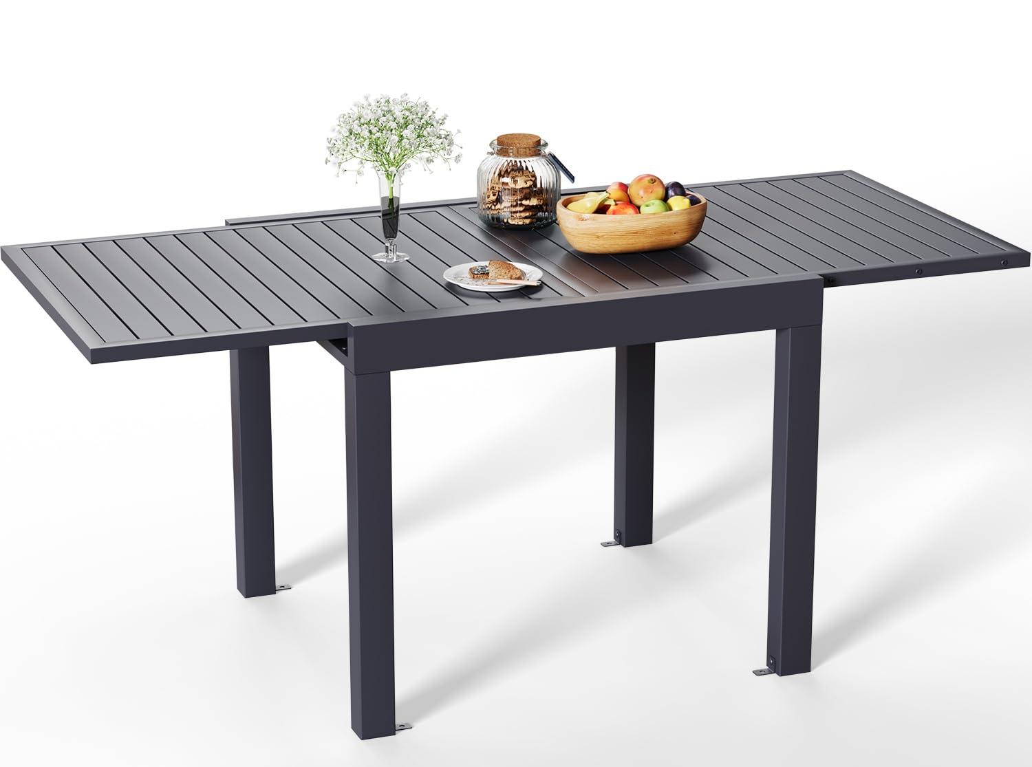 Homall Extendable Aluminum Garden Dining Table set up in a patio