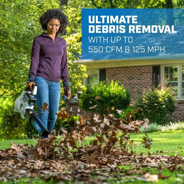 User clearing leaves with HART 40-Volt Blower