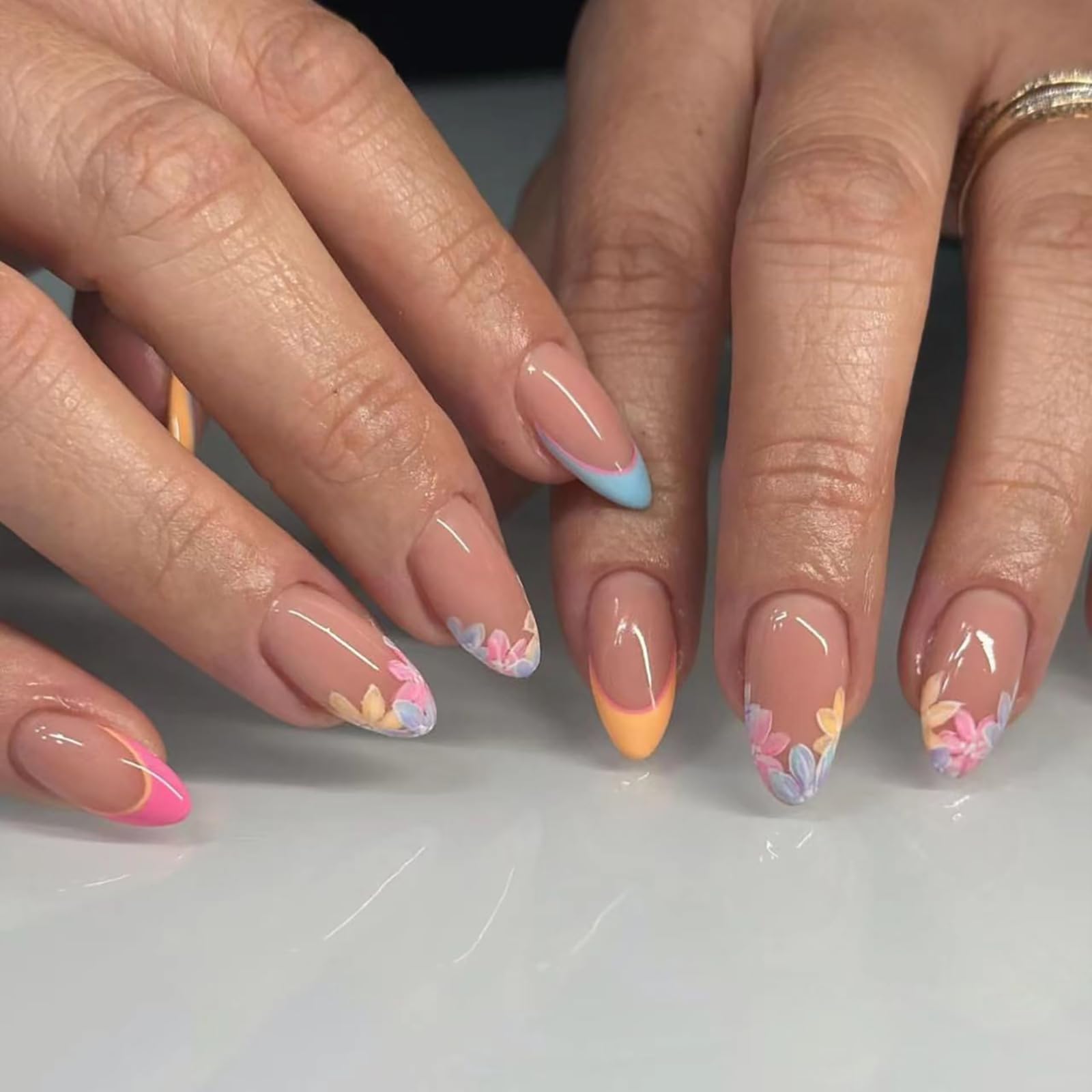 Photo 1 of French Tip Press on Nails Medium Almond False Nails with Colorful Flower Designs Fake Nails Pink Glossy Reusable Acrylic Nails Full Cover Handmade Stick on Nails Artificial Nails for Women Girls 24Pcs