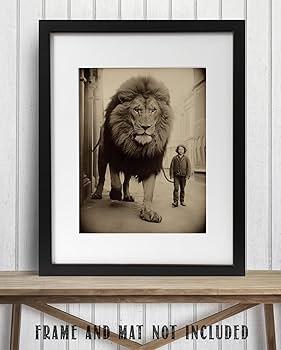 Amazon.com: Vintage Boy Walks Massive Lion on a Leash in the Amazon.com: Vintage Boy Walks Massive Lion on a Leash in the