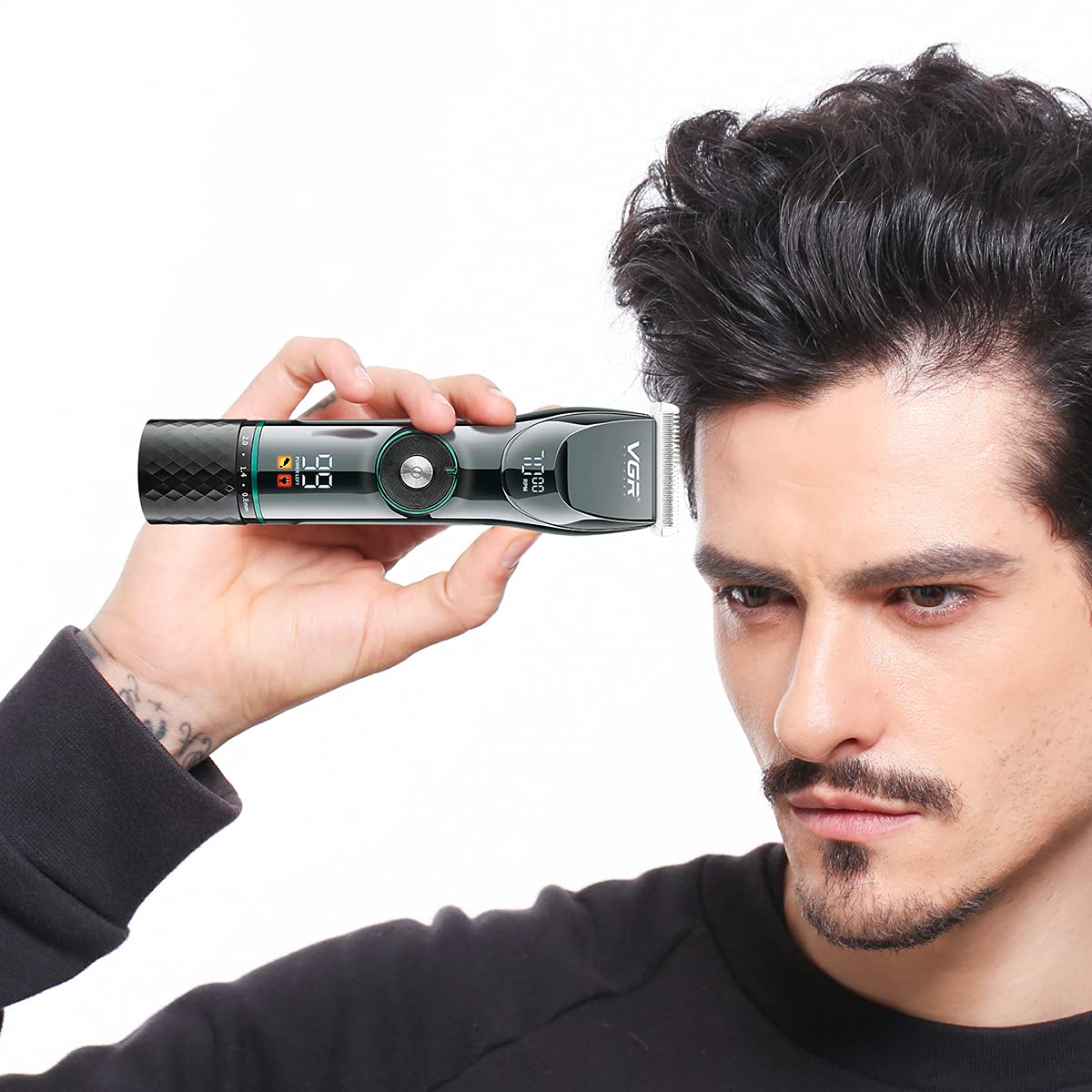 Man using VGR Hair Clipper V-256 to trim hair