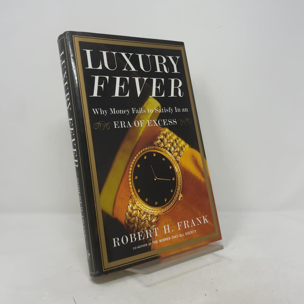 Luxury Fever: Why Money Fails to Satisfy in an Era of Excess