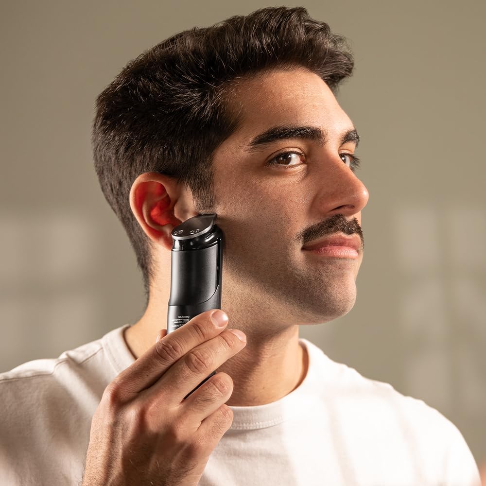 Man using the nose trimmer attachment of the Cecotec PrecisionCare Multirooming Trimmer