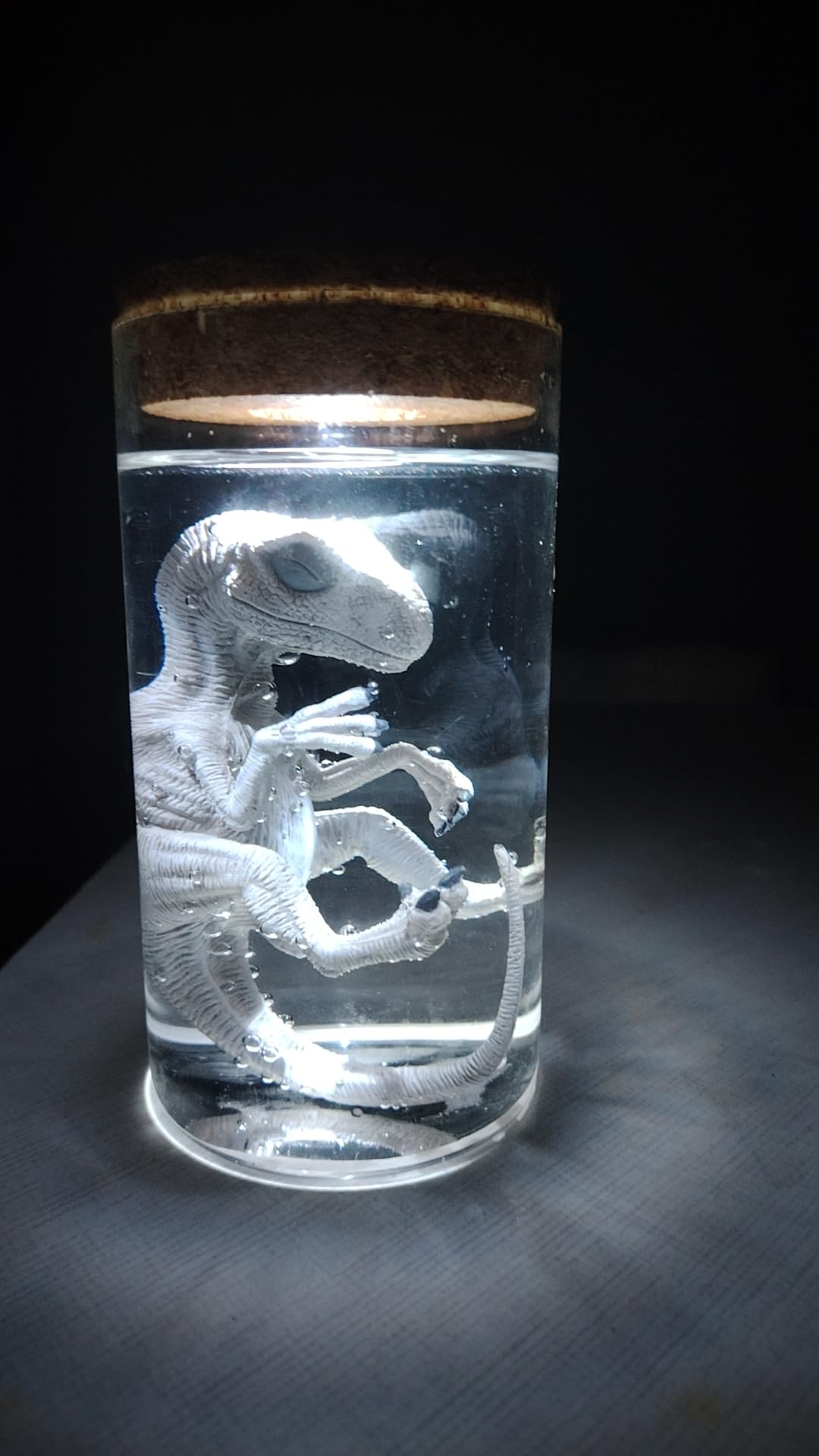 Unique Dinosaur in Glass Bottle Figurine - A Touch of Jurassic Charm
