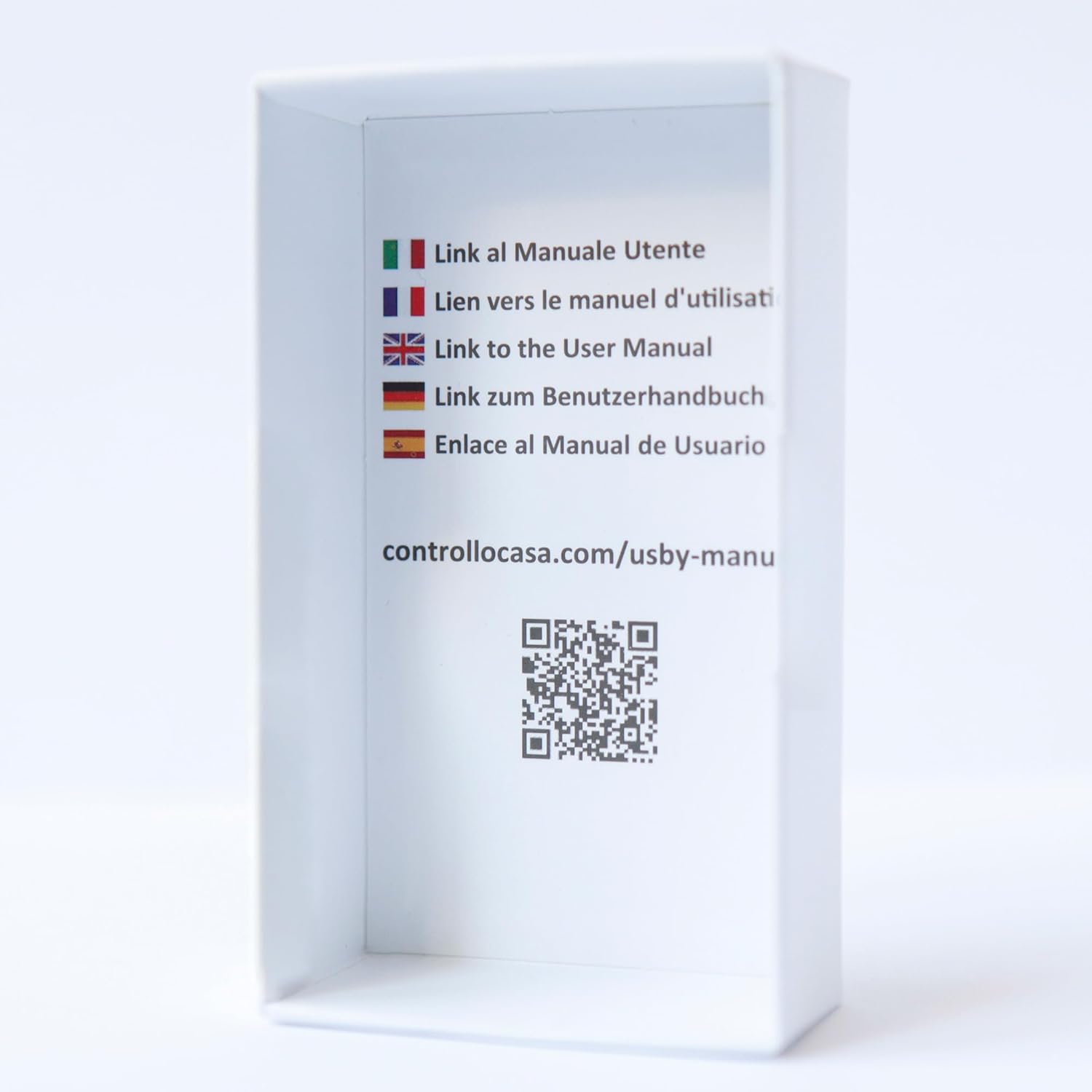 Product box interior with flags for different languages and a QR code linking to the user manual.