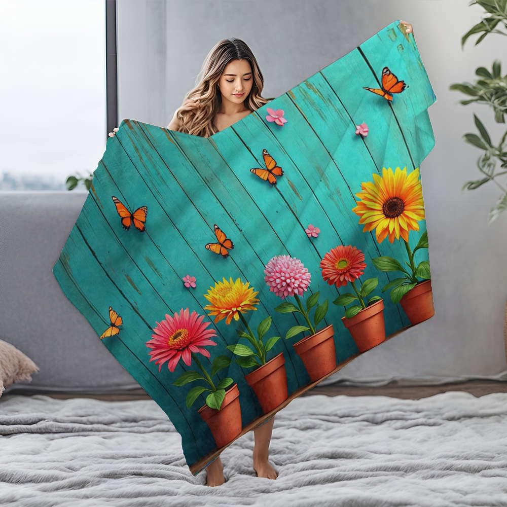 Grande couverture en flanelle fleurs pour vos soirées lecture cocooning