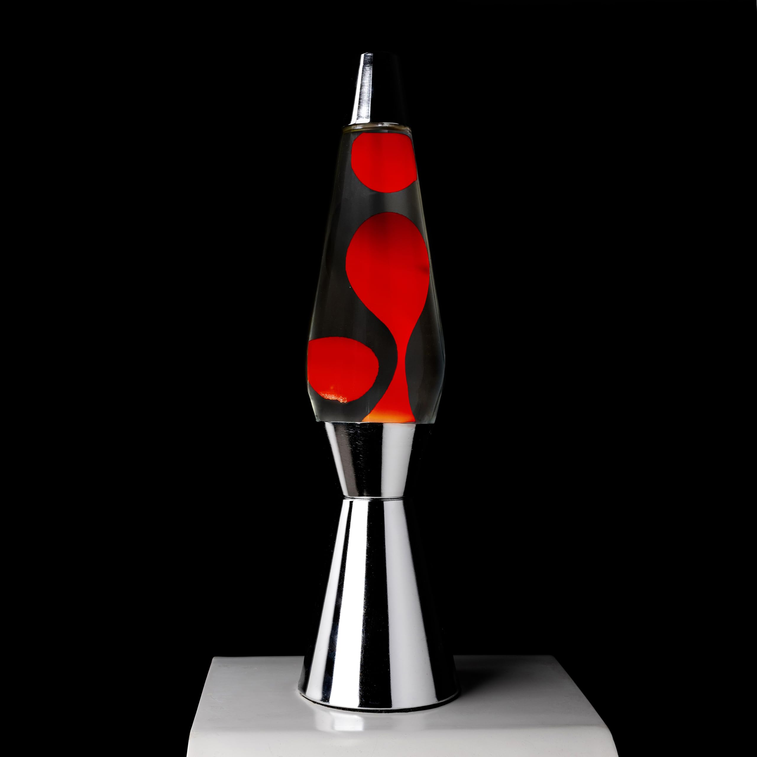 Fisura - Lampada lava rossa con base cromata, cera rossa e liquido trasparente. Design retrò con lampadina di ricambio. Dimensioni: 11,5 cm x 11,5 cm x 40 cm.