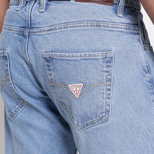 Image of GUESS Men Rodeo in Light Solid Relaxed Fit Denim Jeans