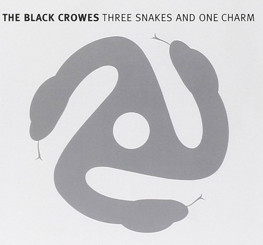 Three Snakes And A Charm: Amazon.co.uk: CDs & Vinyl