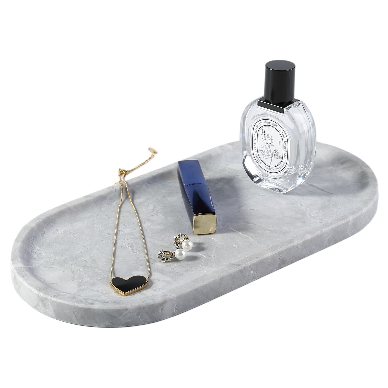 Plateau de rangement en pierre Koville pour organiser bougies et cosmétiques sur la commode