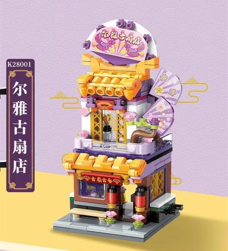 Assembled Keeppley City Corner Building Block Model K28002, a yellow building with a sandwich sign, labeled 'Hong Kong'.