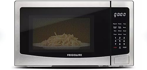 FRIGIDAIRE Horno de microondas de acero inoxidable, multifunción, programable, 1.1 pies cúbicos 1000 vatios