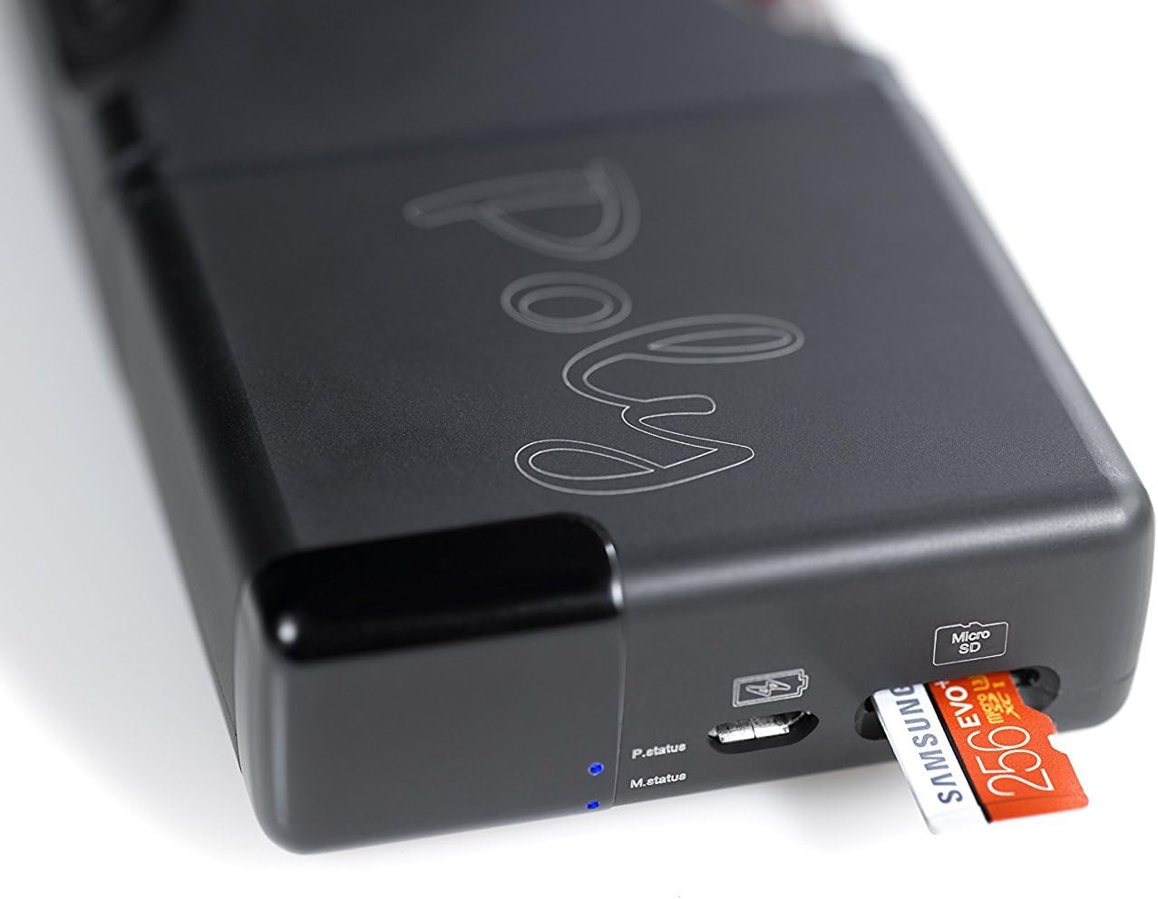 Close-up of the Chord Poly with a Micro SD card partially inserted into its slot.