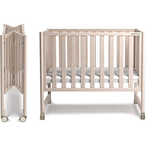 EvoNook 6-in-1 Convertible Mini Crib - Easy Assembly, Portable Folding Baby Mini Crib with Wheels, 100% New Zealand Wood, 4 Adjustable Mattress Heights, Washed Nature with Mattress