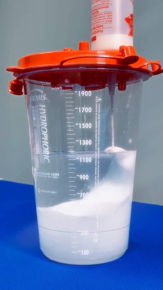 Image of Safetec Red Z Spill Control Solidifier, 15 oz. shaker top bottle (12 bottles /case)
