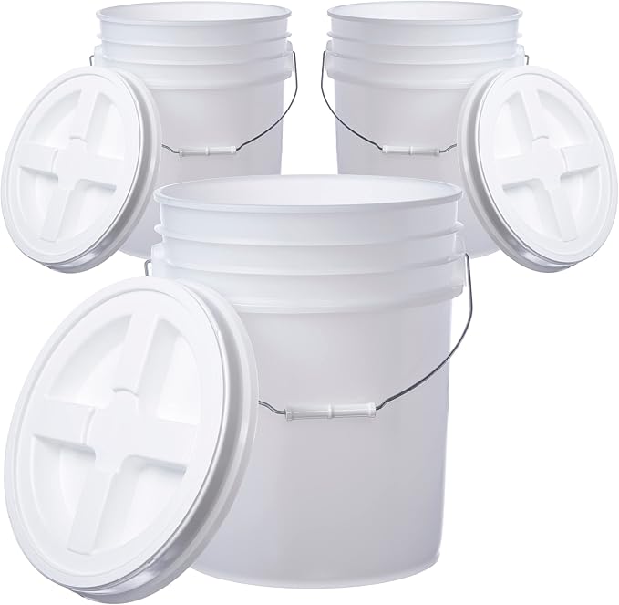 3 white storage buckets with lids