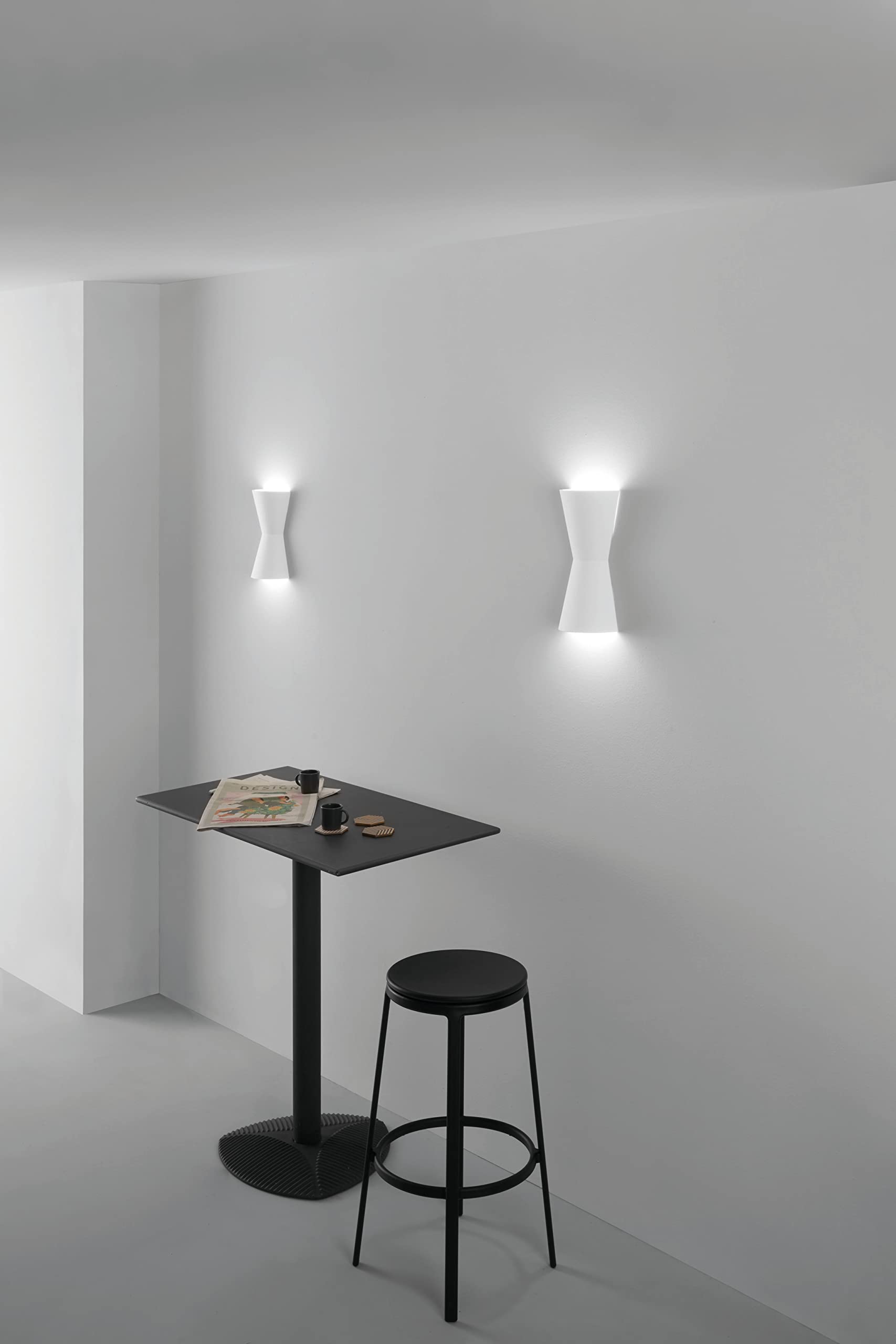 Intec Applique CLEPSYDRA in gesso bianco verniciabile con luce biemissione 30 cm.