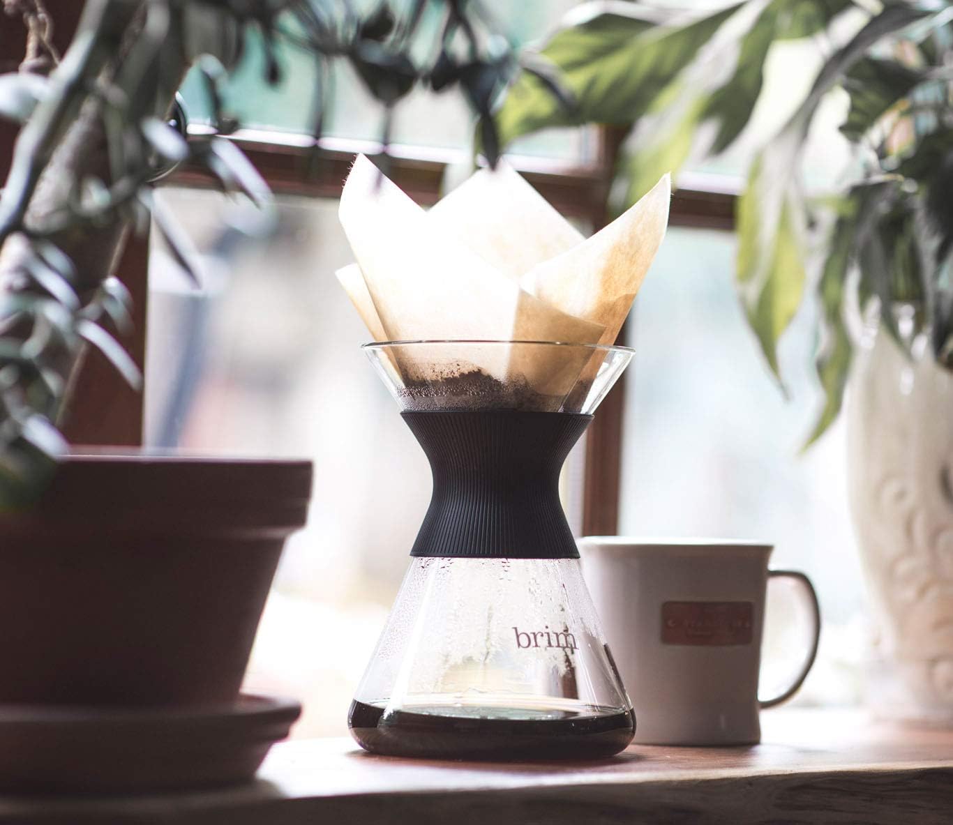 Close-up of coffee grounds blooming in a pour over filter