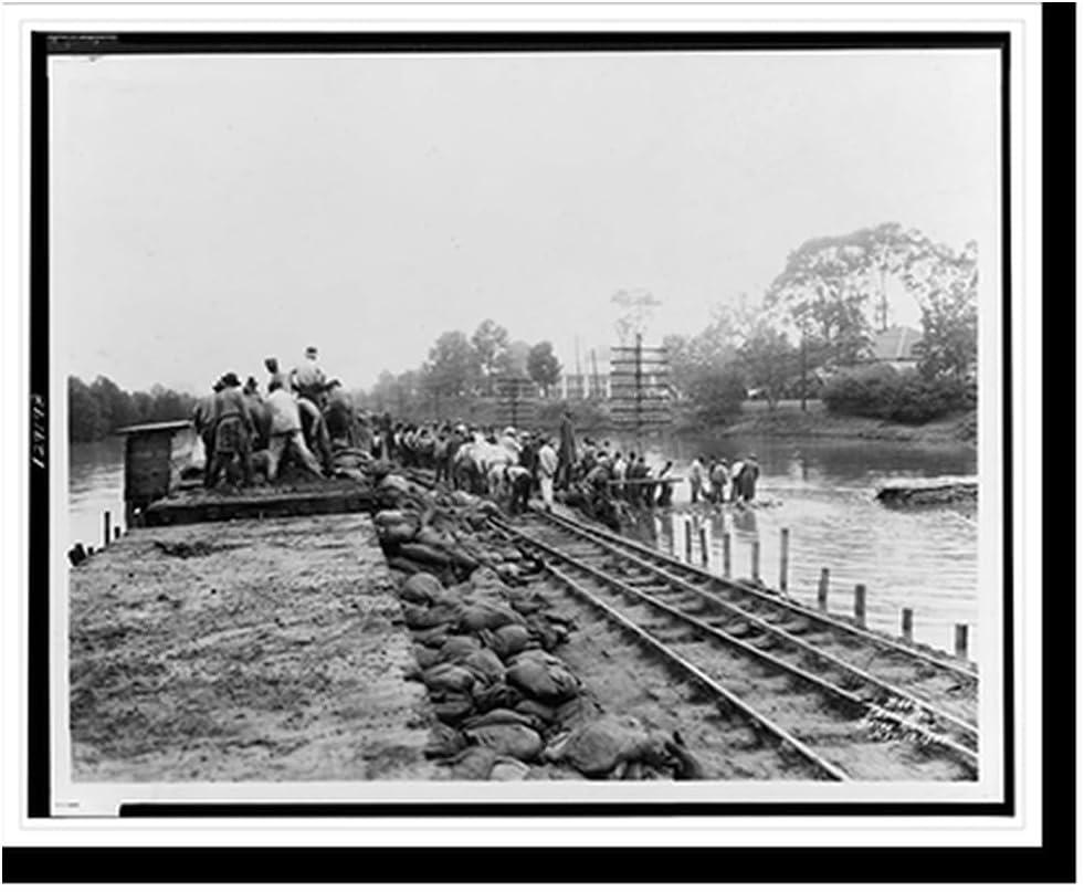 Snapshots of the Past [Workers unloading sandbags from flatbed railroad car