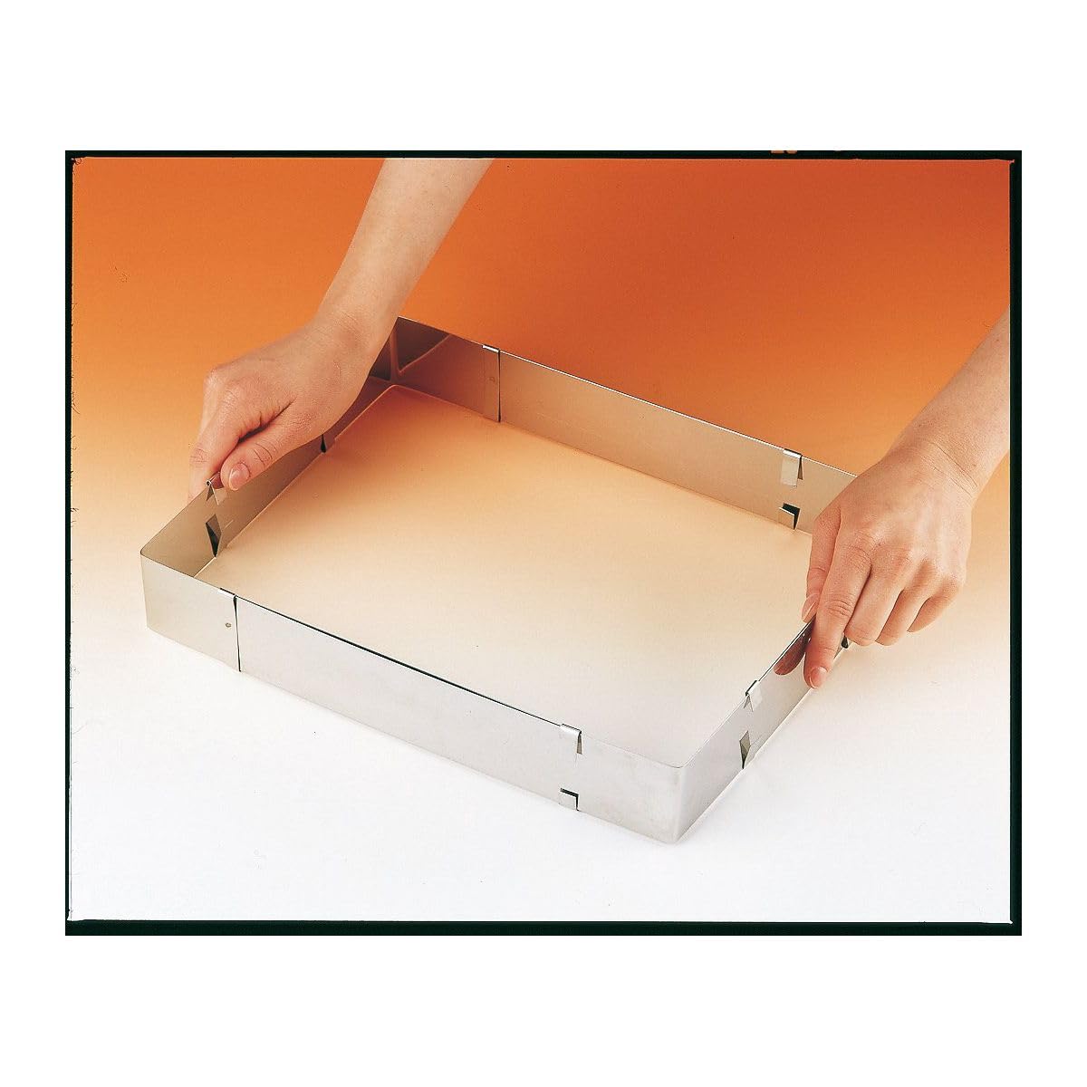Zenker Pierścień do ciasta cukierniczy regulowany w kolorze srebrnym, stal nierdzewna, 27,5-52 cm x 18,5-34 cm