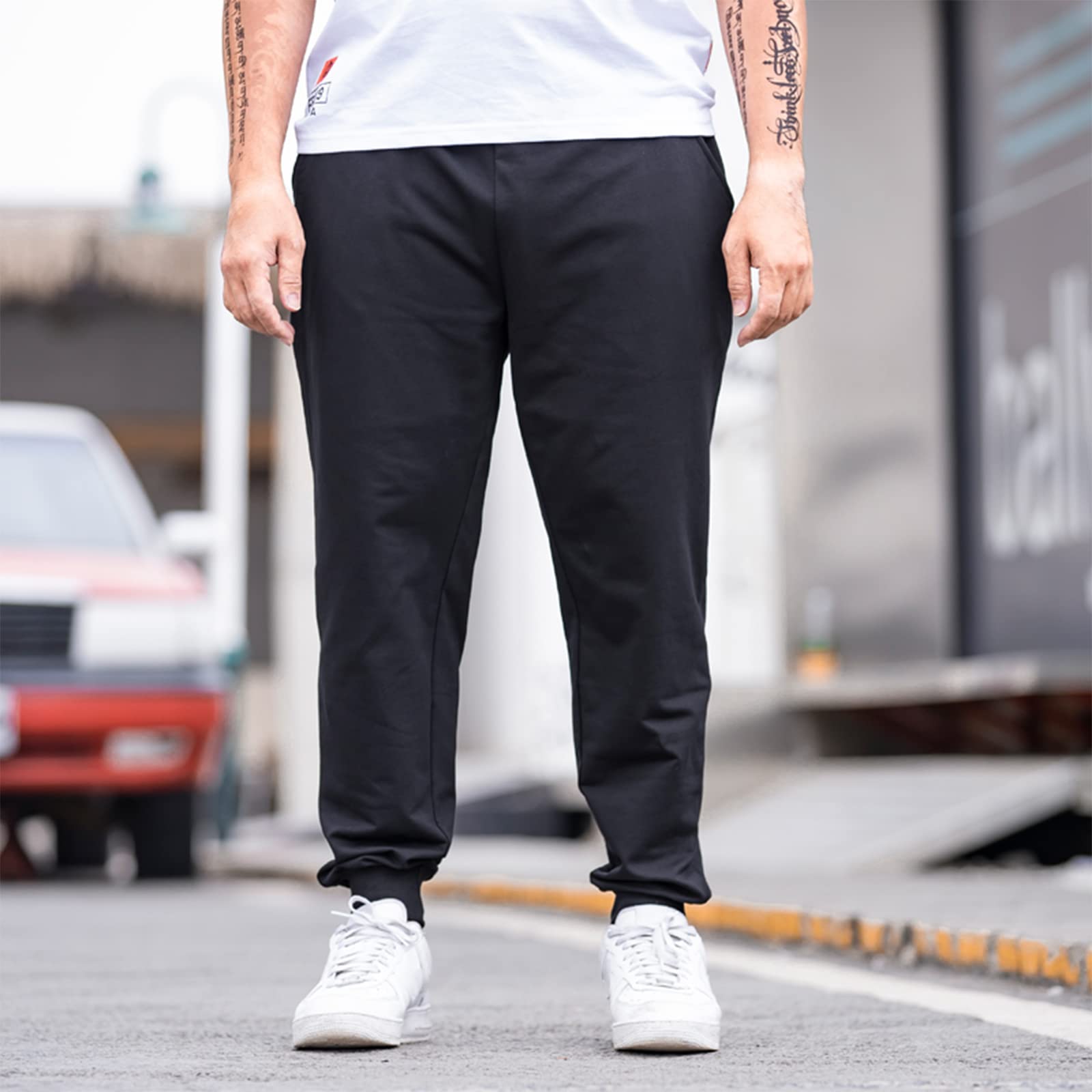 Uomo Taglie Forti Loose Fit Pantaloni Sportivi Affusolati in Cotone Pantaloni Casual Semplici (L-8XL)