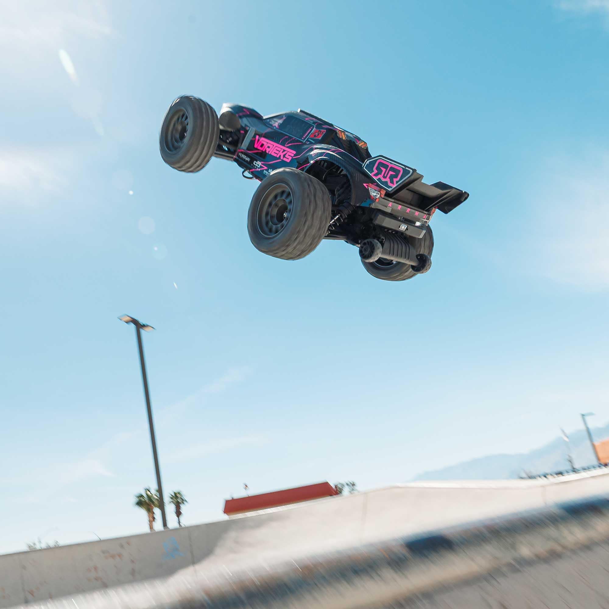 ARRMA Camión RC 1/10 VORTEKS 223S DSC 2WD RTR Camión Estadio sin escobillas, Rosa, (batería Lipo y Cargador no incluidos) ARA3505T3