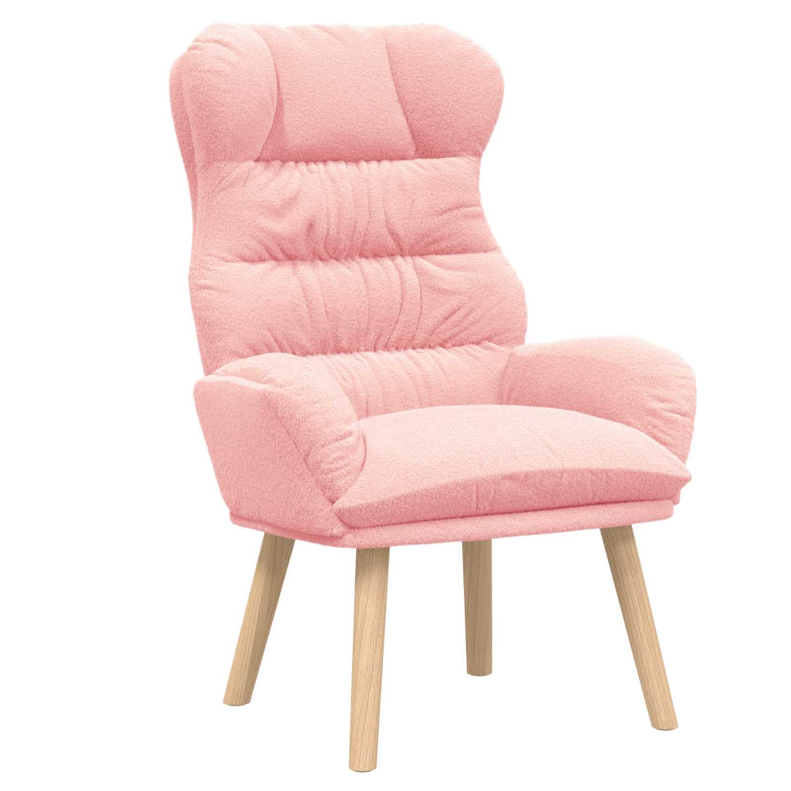 Fauteuil rose en Sherpa pour créer un coin lecture cosy dans votre salon
