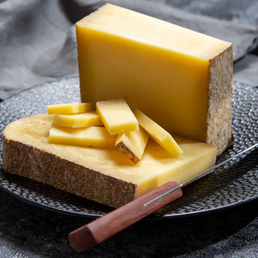 Comté d'été AOP fabrication artisanale affinage minimum 24 mois - 1kg - Pâte jaune avec cristaux et saveur noisette intense