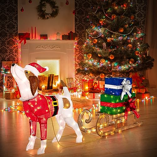 Decorazioni natalizie illuminate di cane e slitta