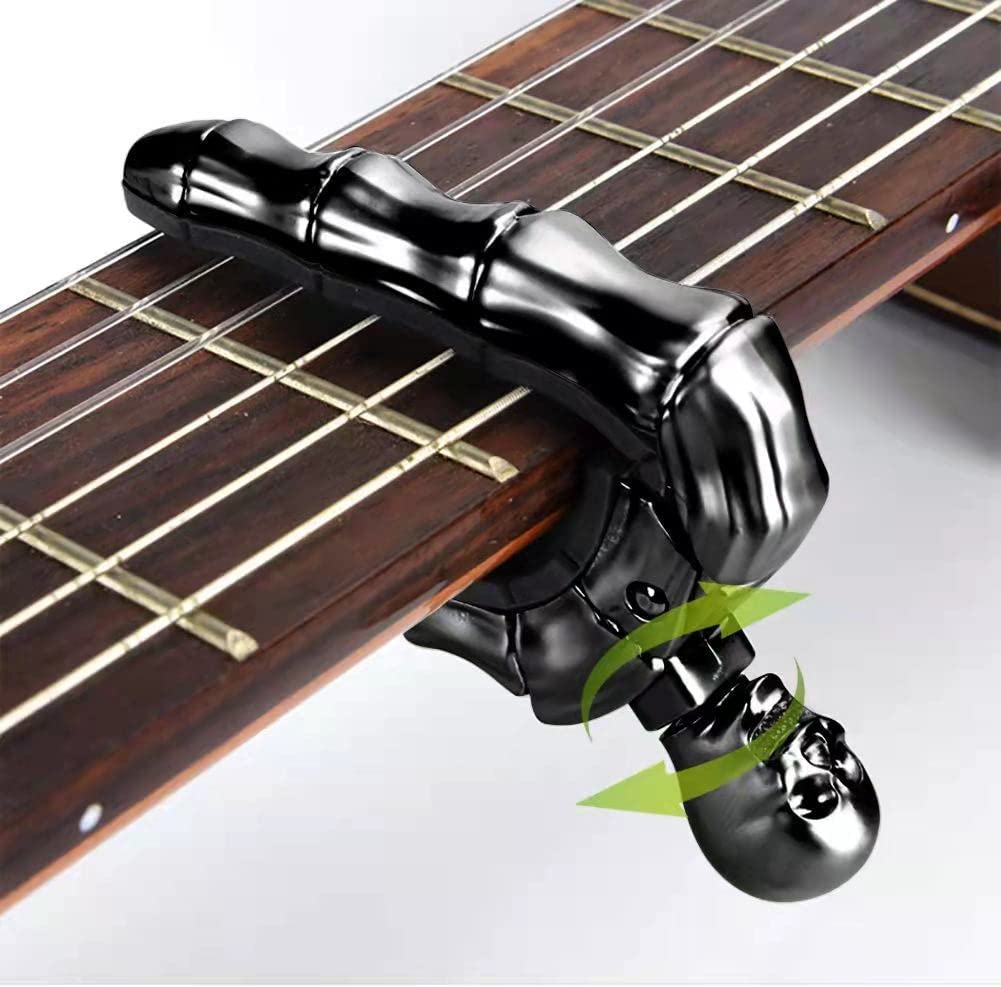 Geva - Pomo de calavera para guitarra acústica y eléctrica, universal, 4, 5, 6, 12 cuerdas, instrumentos, cejillas, bajo, ukelele, mandolina, banjo... (bronce)