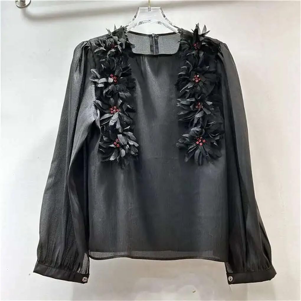 Camicetta sottile da donna a maniche lunghe con fiori colorati prospettiva elegante