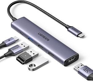 UGREEN Revodok USB C Hub 5-in-1, 4K HDMI Multiport Adapter, 100W Charging Port, 3 USB A 5Gbps Data Transfer, Compatible with MacBook Air/Pro, HP, ASUS, iPad Pro/Air, iPhone 17 Pro/Max, Gray