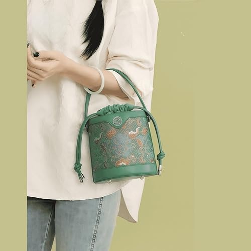 Silk shoulder bag showing traditional floral pattern details and textures