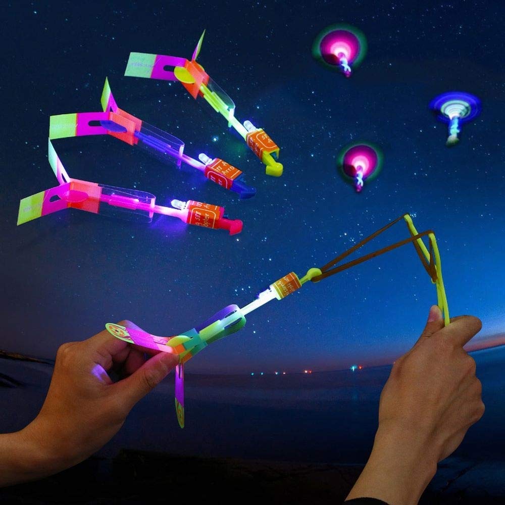 6PCS Amazing LED Light Arrow Flying Toy Party Fun Gift Elastic Slingshot Flying Copters Birthdays Thanksgiving Christmas Day Outdoor Game for Children Kids (Random Color)