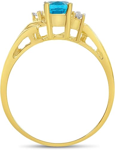 Miniatura 5 de Anillo de oro amarillo de 14 quilates con topacio azul ovalado y diamantes