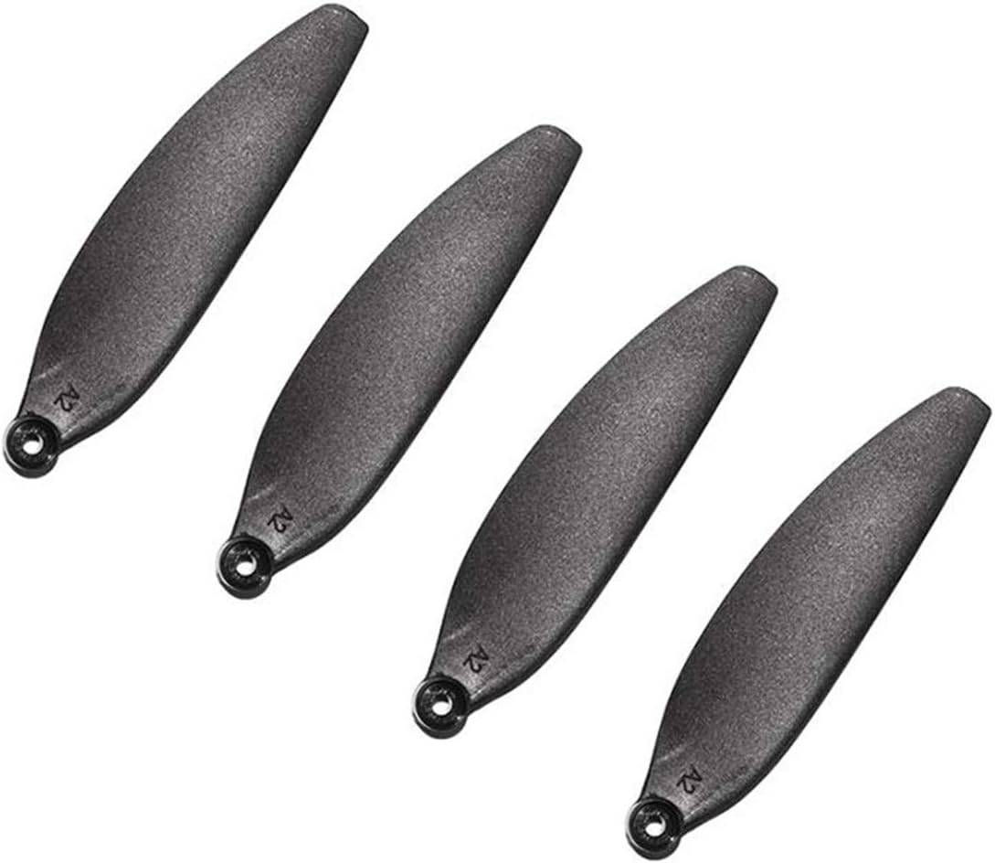 Four black propeller blades for a drone, arranged diagonally.