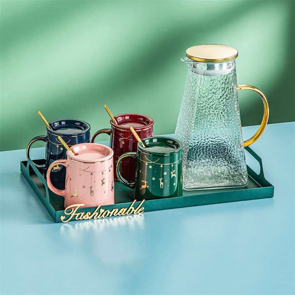 Service à thé avec théière en verre thermorésistant et tasses scandinaves