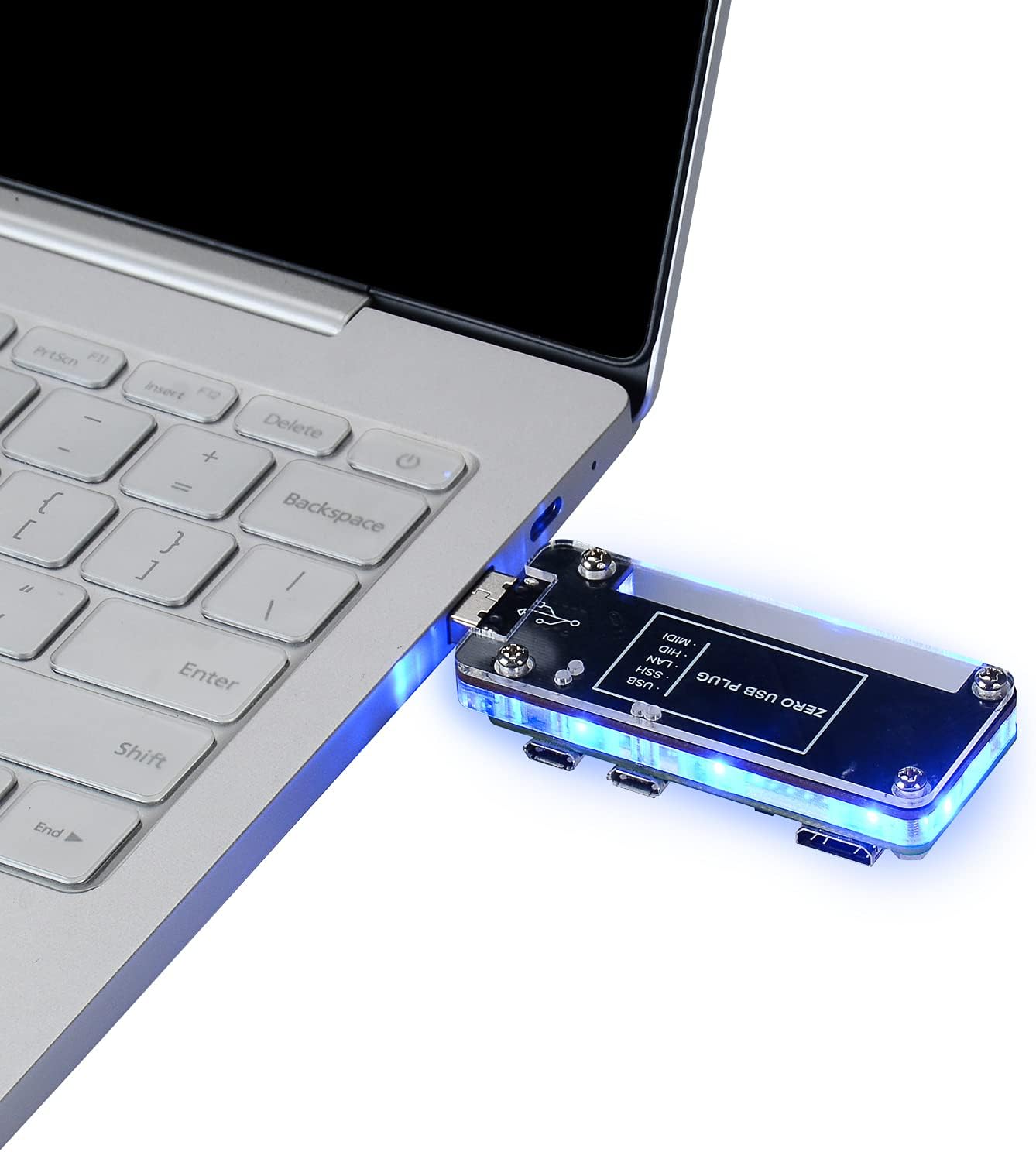Hinteren view of the GeeekPi USB Dongle Expansion Board with Raspberry Pi Zero plugged into a laptop, showing the labeled ports.