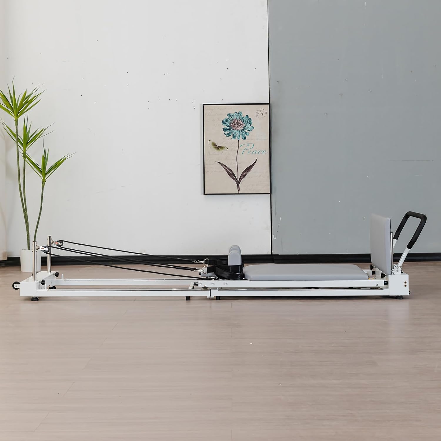 Máquina reformadora de pilates plegable para fuerza central, equilibrio y moldear el cuerpo, diseño compacto para uso doméstico y estudio