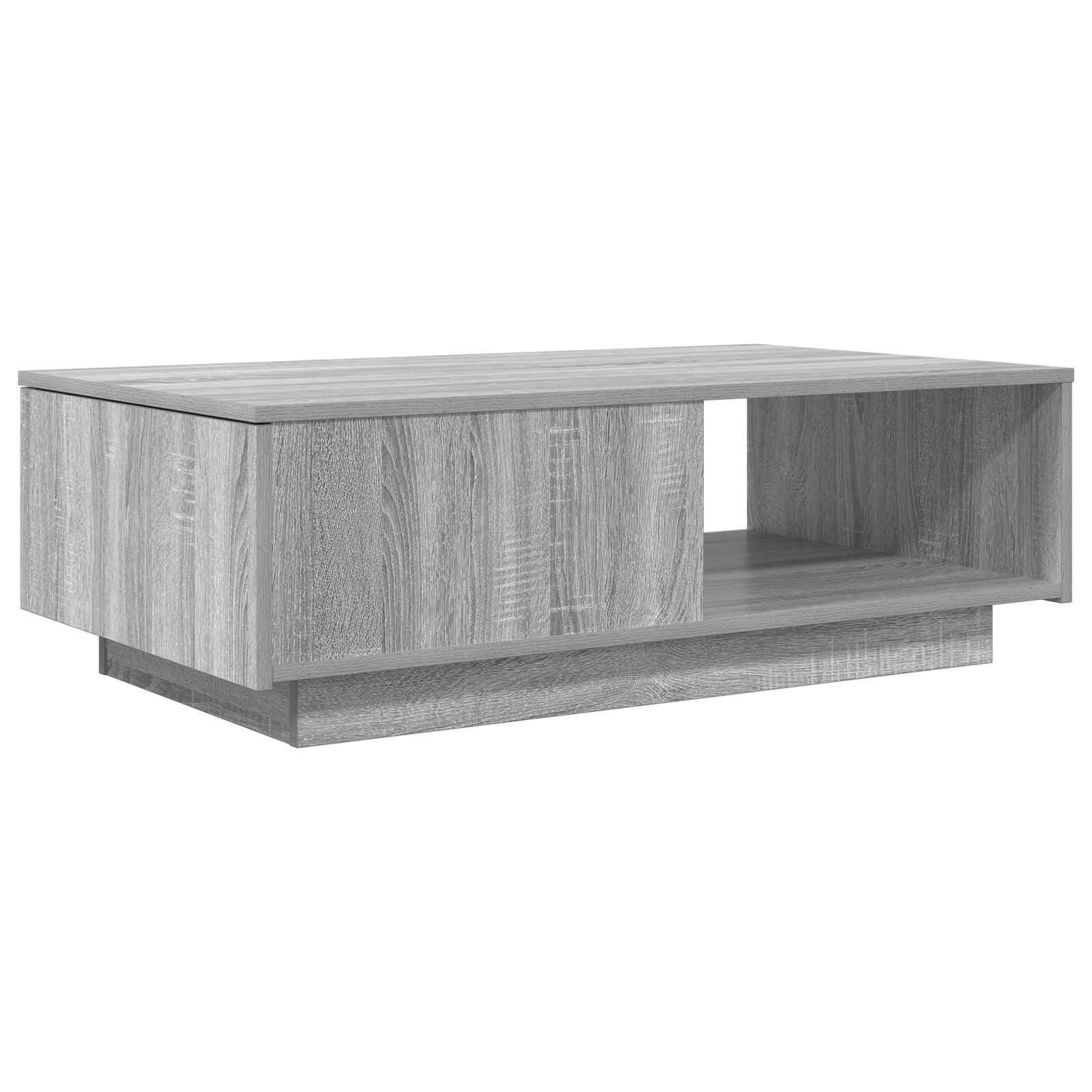 Table basse moderne en bois grise pour des soirées salon chaleureuses