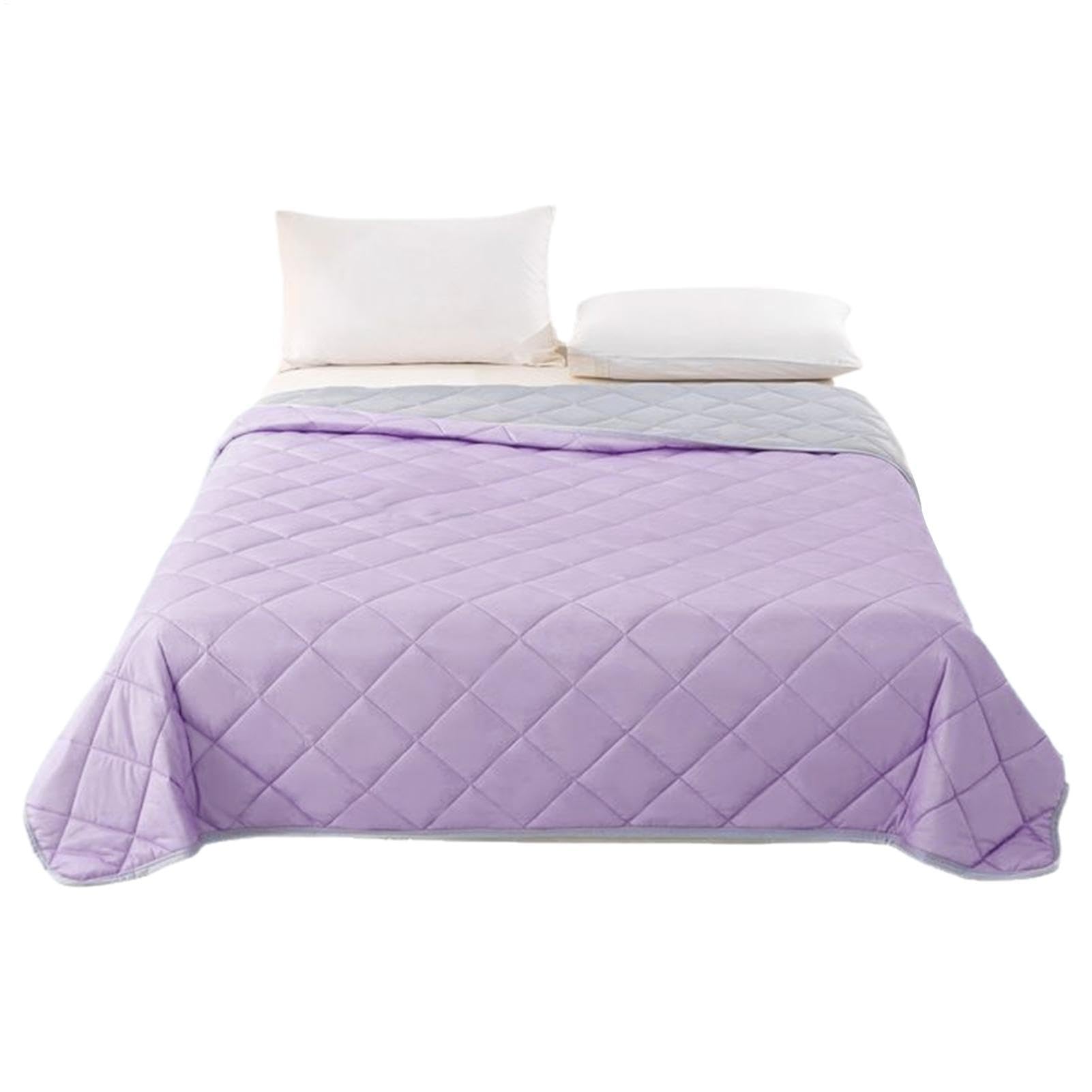 Couette double face fraîcheur pour le canapé de votre salon
