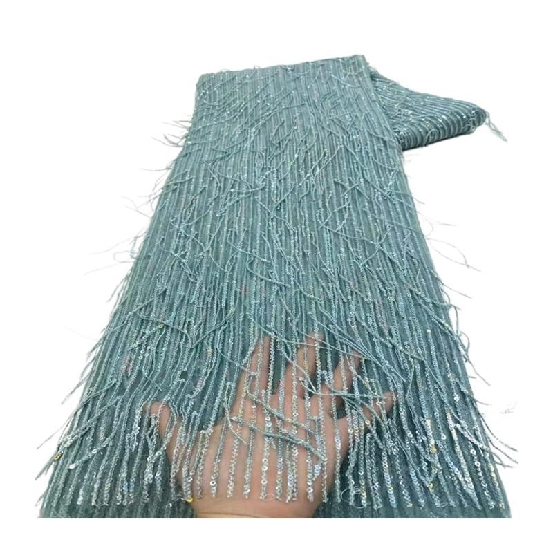Tissu dentelle vert à paillettes et pampilles de perles pour robe et couture