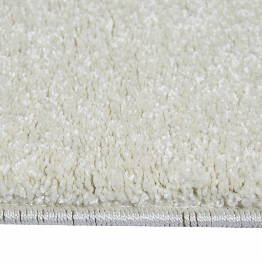 Nowoczesny designerski dywan do salonu w jednolitym wzornictwie w kolorze kremowym 160 x 230 cm